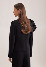 Taillierter Blazer mit abnehmbarer Blüte in Schwarz |  Seidensticker Onlineshop