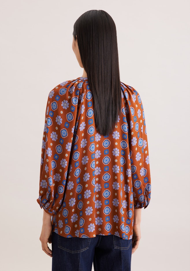 Satinierte Tunikabluse mit Volumenärmeln in Orange | Seidensticker Onlineshop